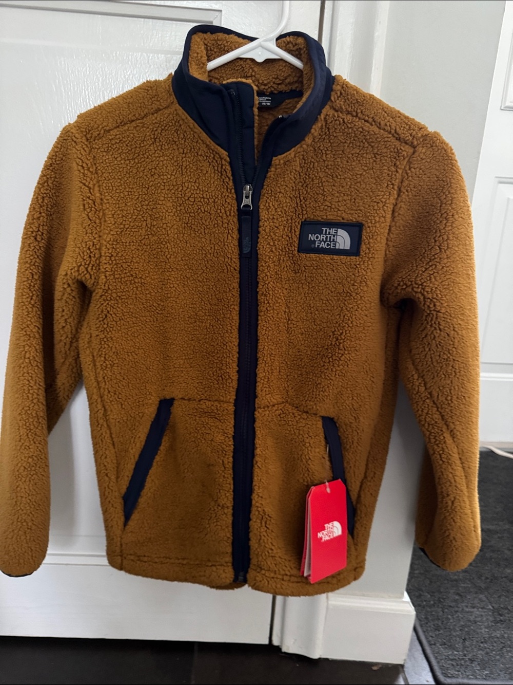 The North Face Kids' Caramel Brown Sherpa Fleece Jacket with Navy Trim